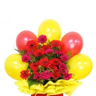 20 red gerberas with 5 red yellow balloons arranged in basket